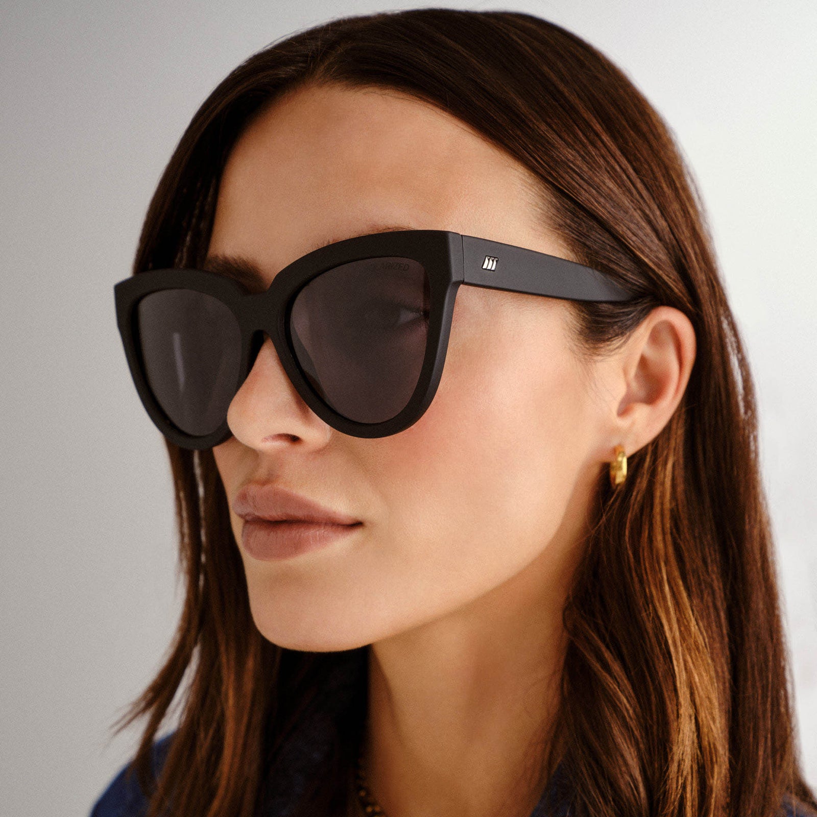Liar Lair Black Rubber Female Cat-Eye Sunglasses | Le Specs