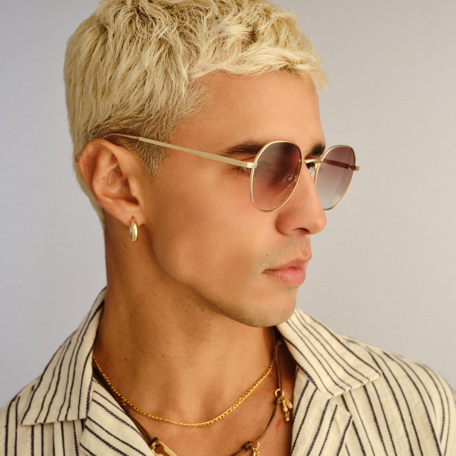 Odyssey Bright Gold Uni-Sex Round Sunglasses | Le Specs
