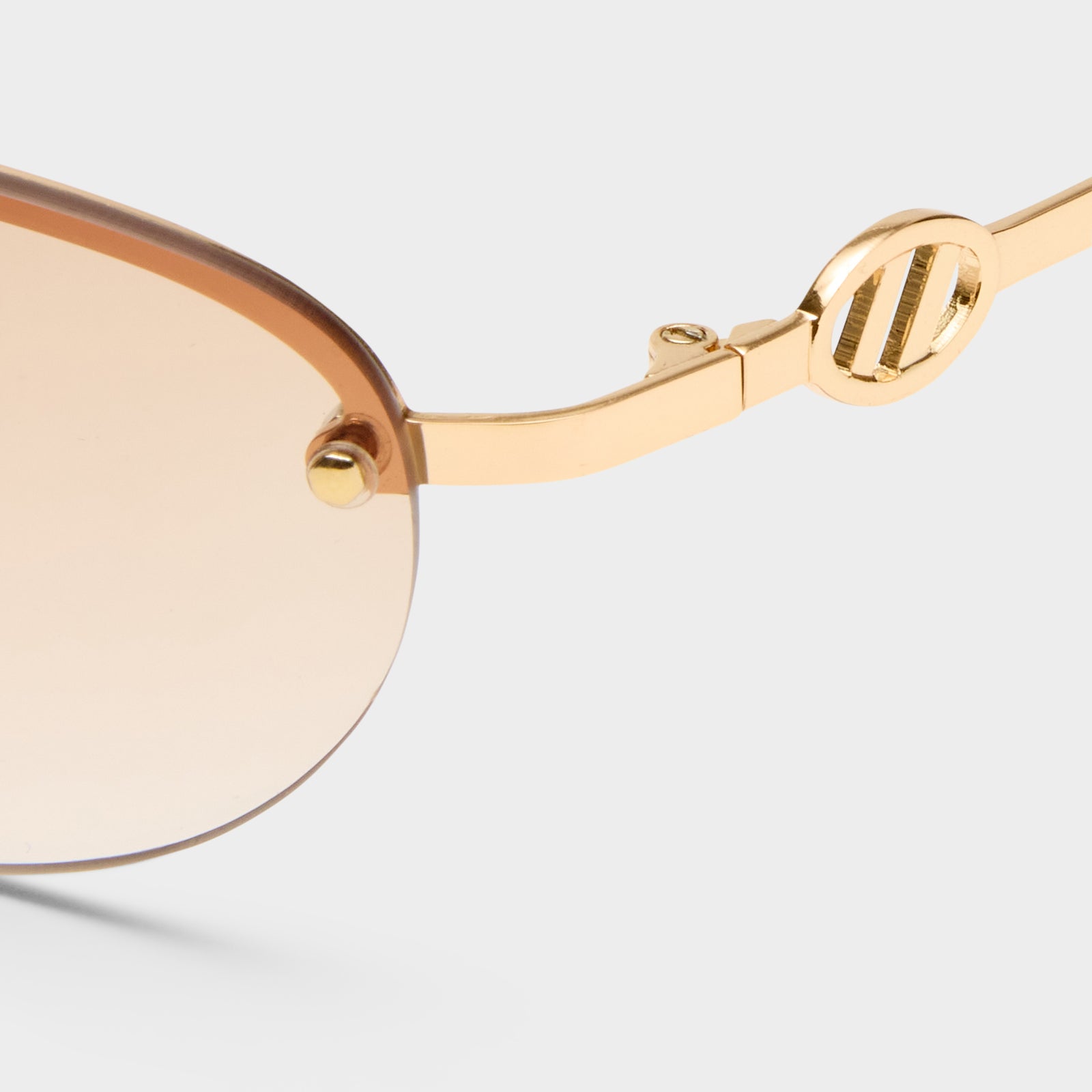 Slinky Gold Female Oval Sunglasses | Le Specs