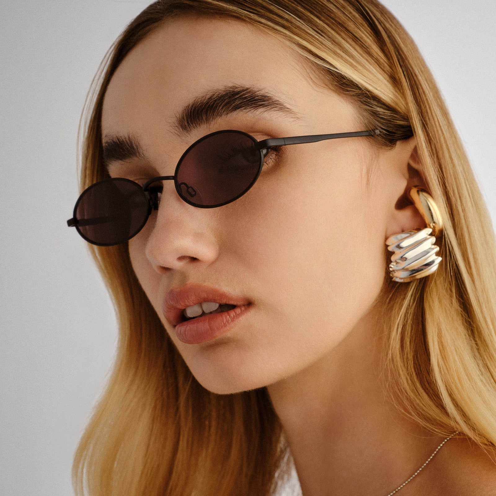 Love Train Matte Black Female Oval Sunglasses | Le Specs