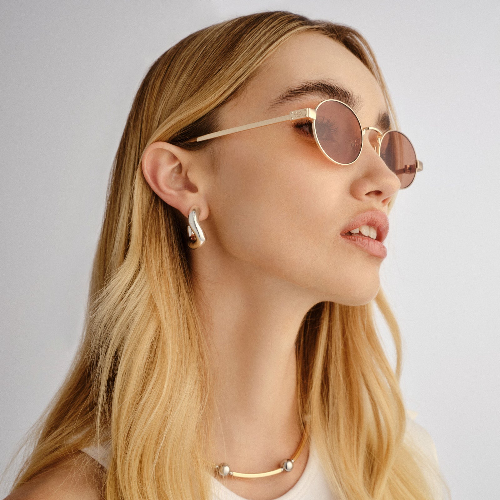 Poseidon Deux Gold Female Oval Sunglasses | Le Specs