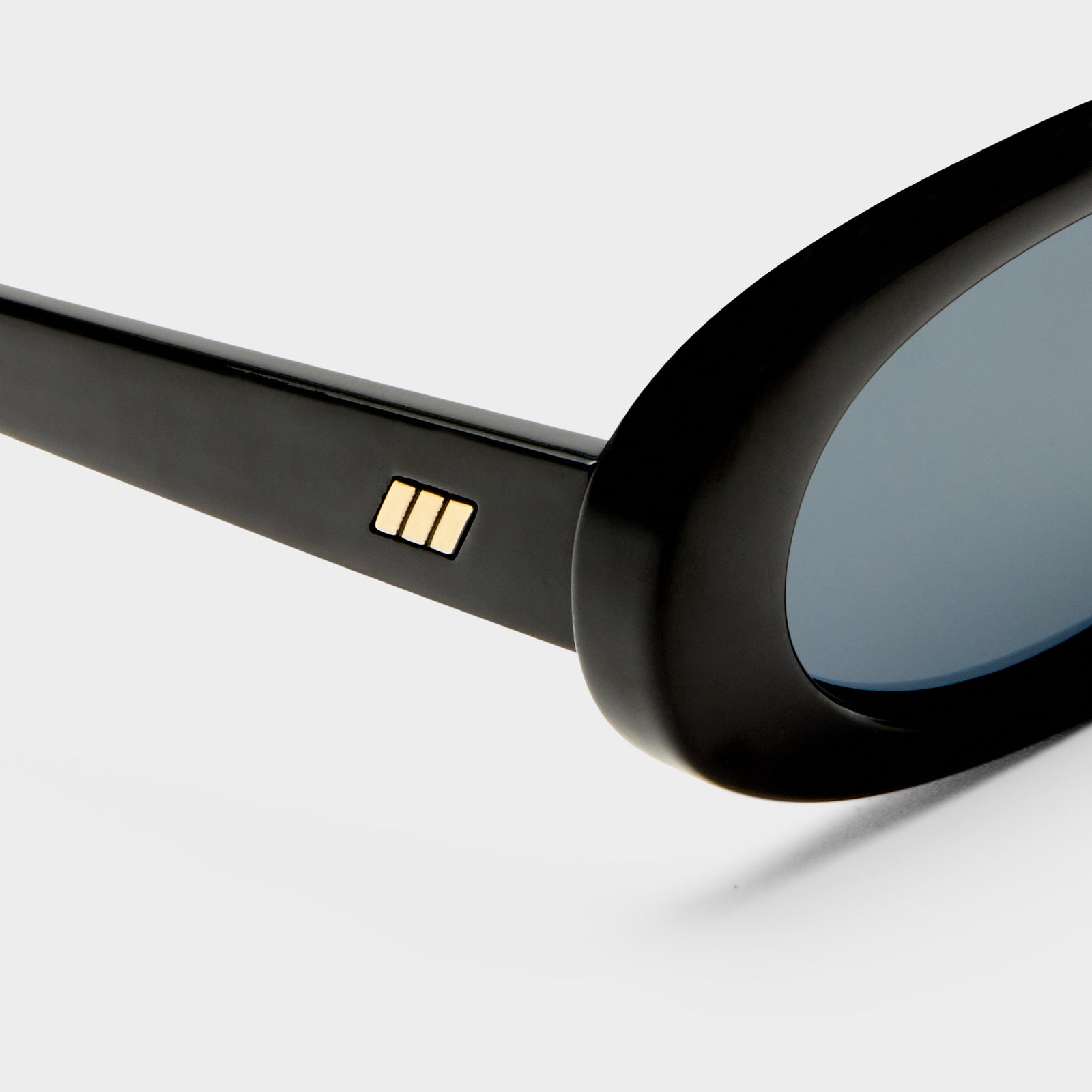 Outta Love + Black Uni-Sex Oval Sunglasses | Le Specs