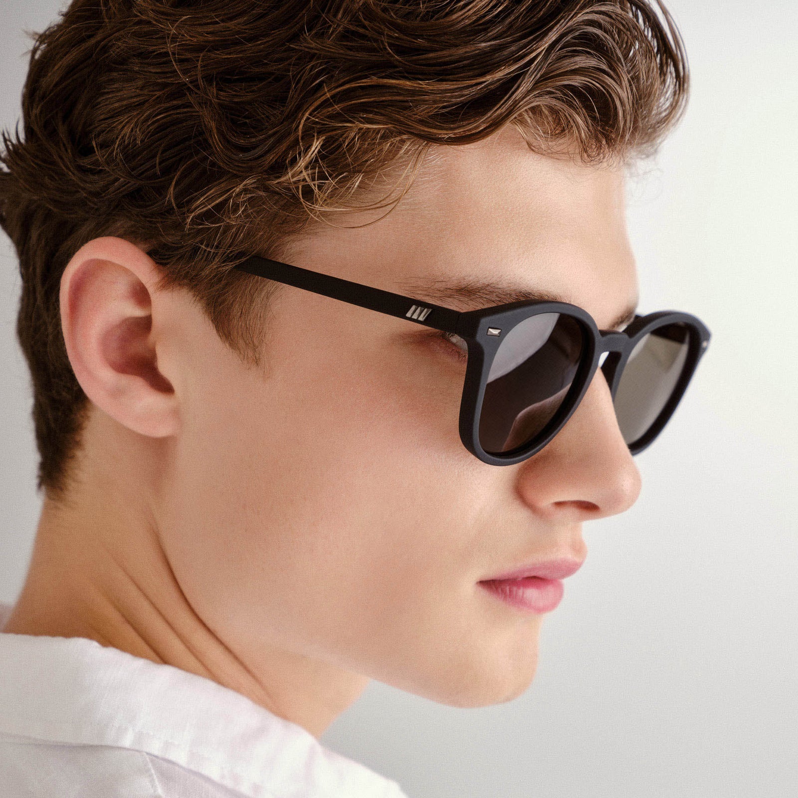 Bandwagon Black Rubber Uni-Sex Round Sunglasses | Le Specs