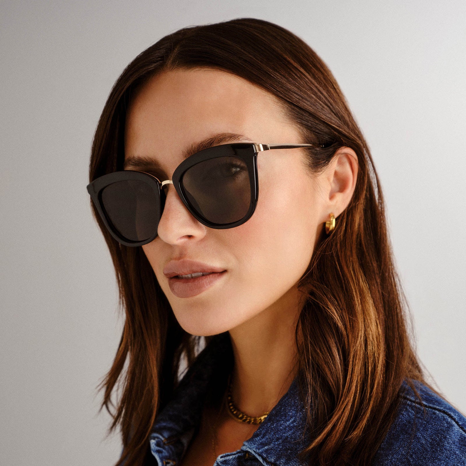 Caliente Black Gold Female Cat-Eye Sunglasses | Le Specs